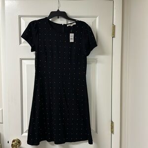 Loft Black mini dress with gold embellishment. Size 6.